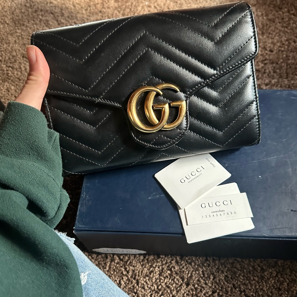 Gucci Quilted Black Leather Clutch with Gold Logo